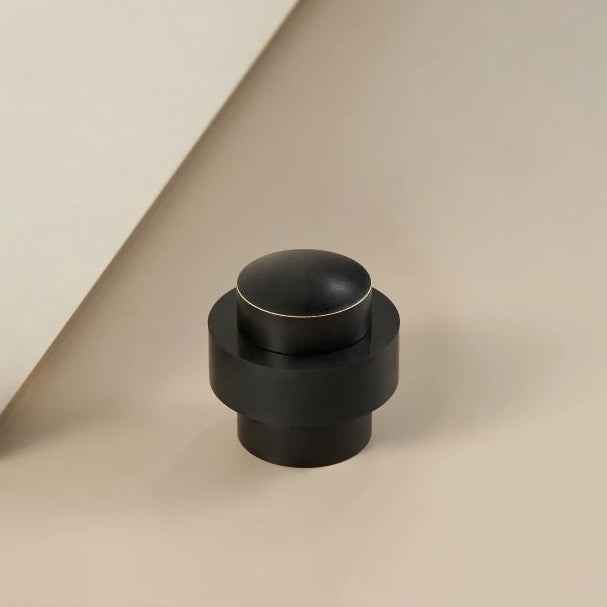 Butée de porte au sol