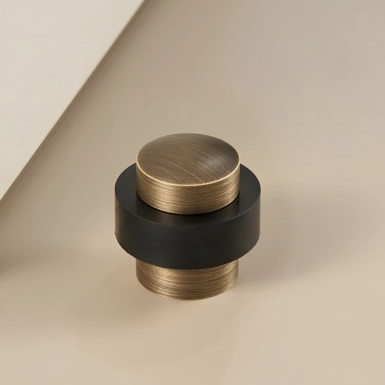 Butée de porte au sol