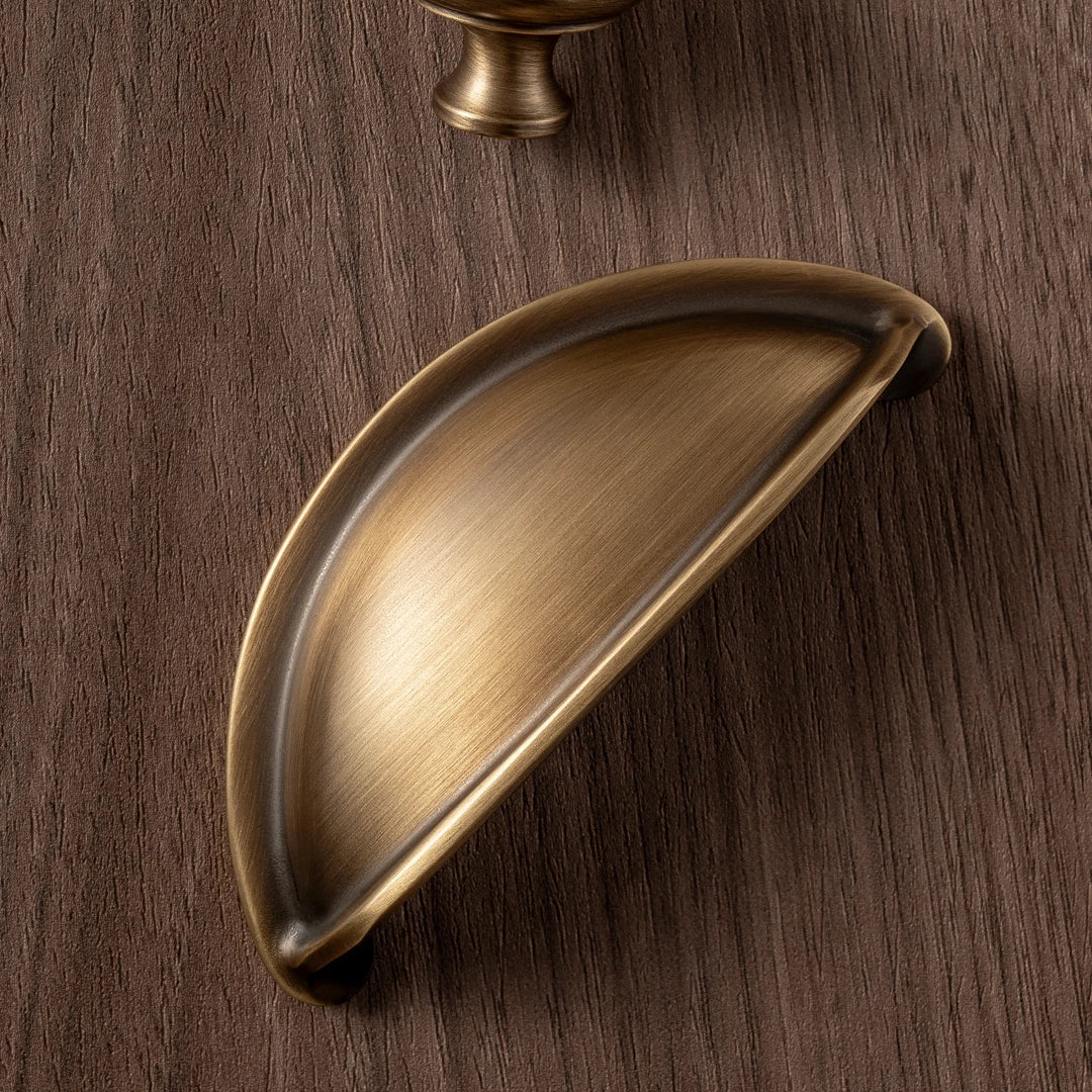 Poignée coquille bronze